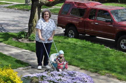 Grandma and Greta Looking at the Flowers2